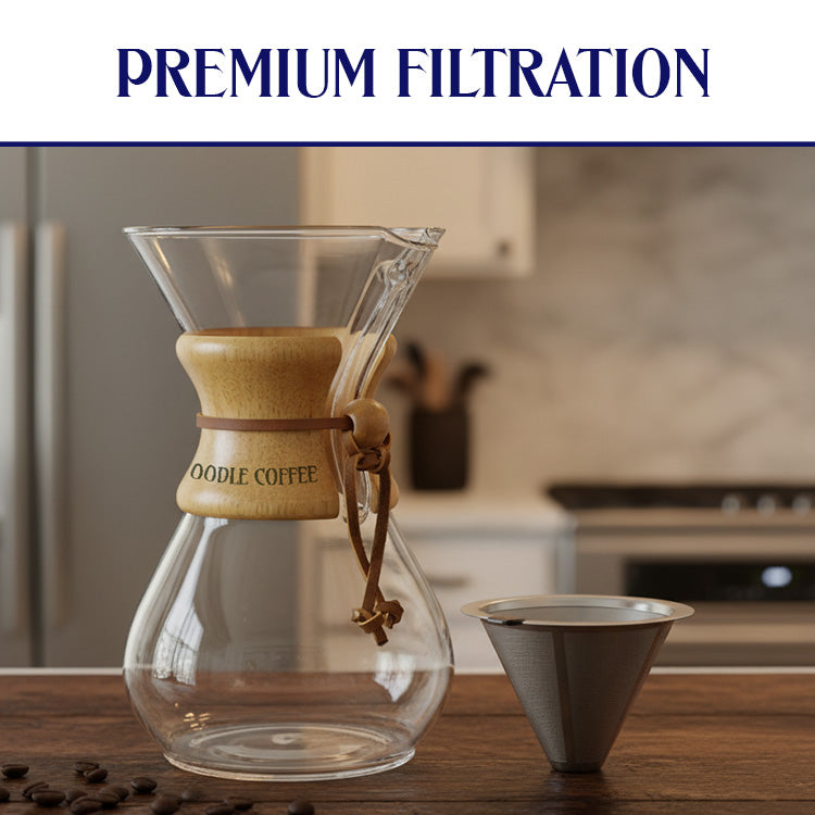 Wooden coffee maker with glass carafe on a kitchen counter, featuring the brand 'Oodle Coffee'.